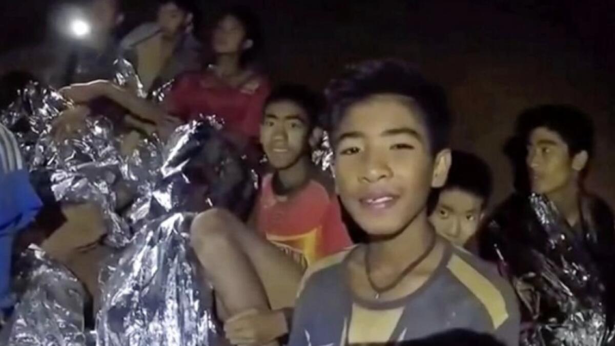 Freed from cave, but doctors orders bar Thai boys from World Cup final 