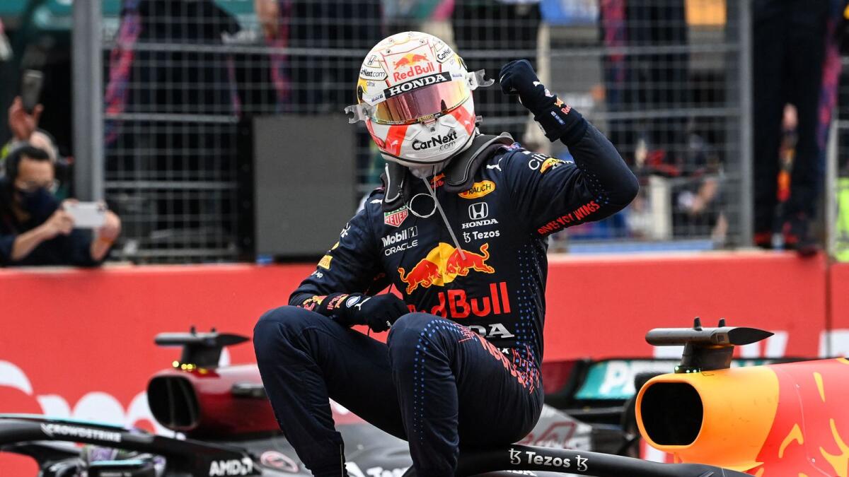 Winner Red Bull's Dutch driver Max Verstappen celebrates after crossing the finish line during the French Formula One Grand Prix. — AFP