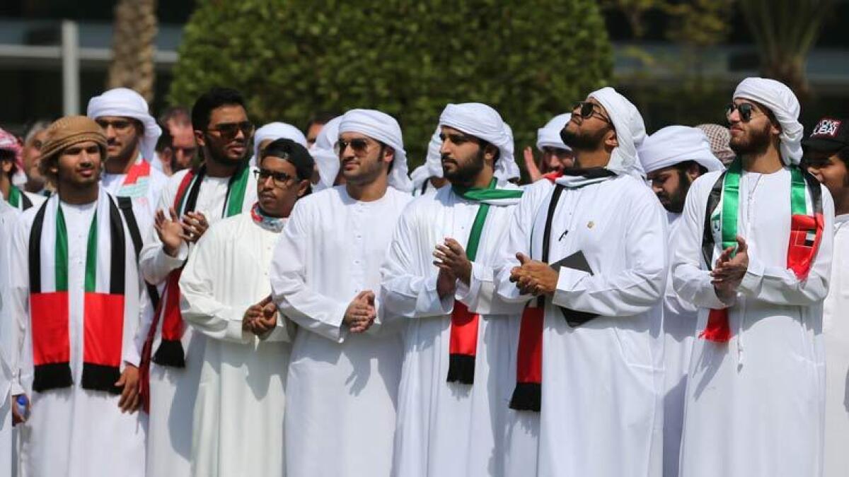 Members of Zayed University in Abu Dhabi celebrate UAE Flag Day. Photo by Ryan Lim/ Khaleej Times