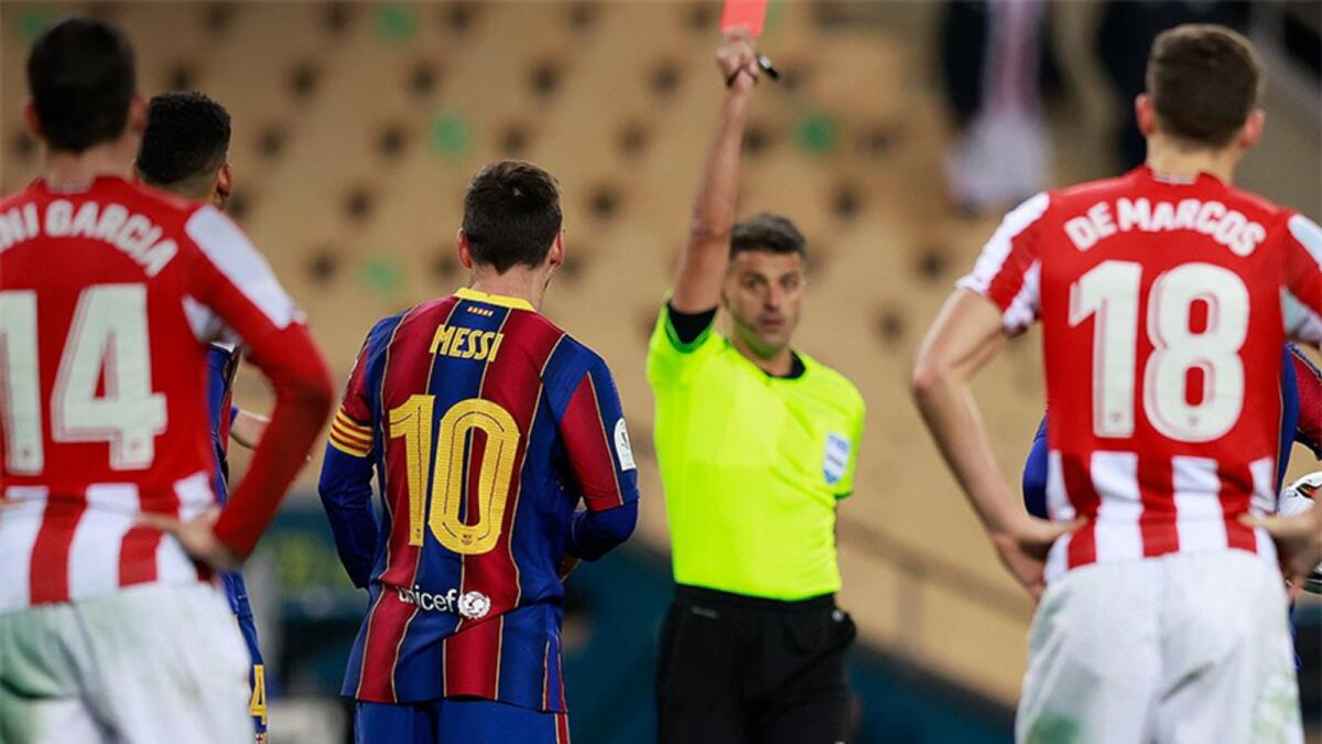 Barcelona's Lionel Messi is shown the red card for a foul on Athletic Bilbao's Asier Villalibre during the Spanish Super Cup final. — Twitter