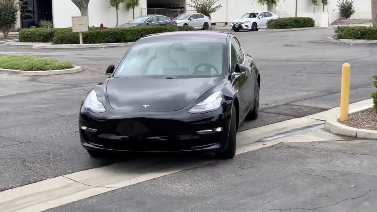 Tesla, parking lot feature